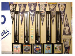 Dodger Blue room display World Series programs and Black Bats.