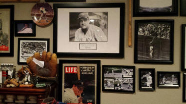 Vintage baseball memorabilia collection wall display
