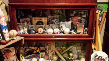 Collectible baseball memorabilia display room