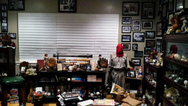 Vintage baseball collectibles memorabilia room display