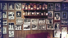Walls of freamed photos baseball memorabilia display