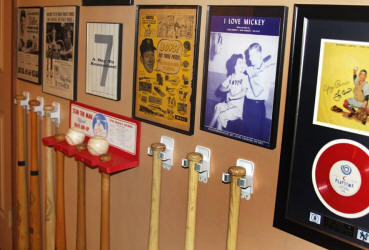 Little League Baseball bat display wall